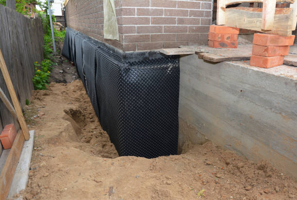 Happy homeowners after waterproofing job in Griffith